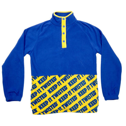 The top half of the fleece is solid blue with a yellow panel for the buttons. The bottom half is yellow with repeating blue writing "Keep it Twisted".