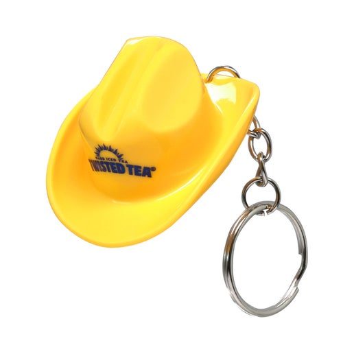 A bright yellow keychain featuring a mini cowboy hat with a blue "TWISTED TEA HARD ICED TEA" logo and sunburst, attached to a silver split ring and chain.