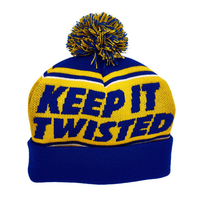 Blue fold over beanie, with a yellow top and writing "Keep it Twisted" in blue on the front and back. Blue and yellow pom at the top of the beanie.