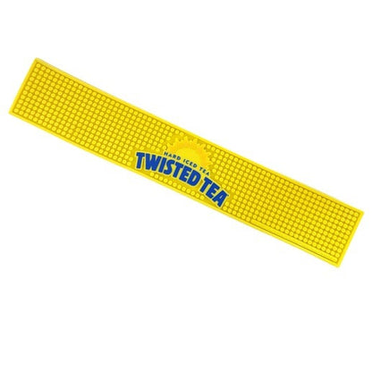 A long, rectangular yellow rubber bar mat with a textured, studded surface. In the center, a blue "TWISTED TEA" logo with "HARD ICED TEA" and a yellow sunburst graphic is prominently displayed.