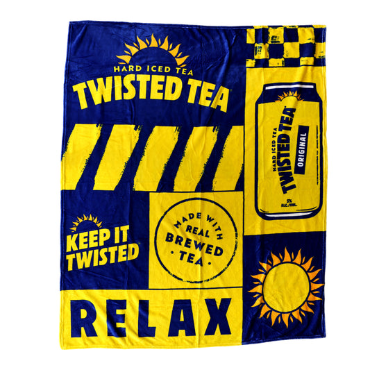 Twisted Tea branded fleece blanket in navy blue and yellow featuring bold graphics, including a Twisted Tea can, sun logo, and text reading “Keep It Twisted,” “Relax,” and “Made With Real Brewed Tea.