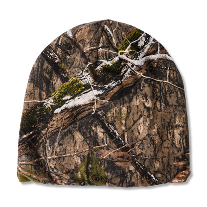 A beanie hat featuring a realistic winter camouflage pattern with brown tree bark, green moss, and white snow, shown against a plain white background.