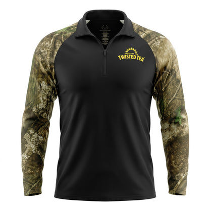 A men's long-sleeve quarter-zip pullover with a solid black body and a woodland camouflage pattern on the sleeves and collar. The left chest features a yellow printed logo that reads 'Twisted Tea' with a sun graphic above it.