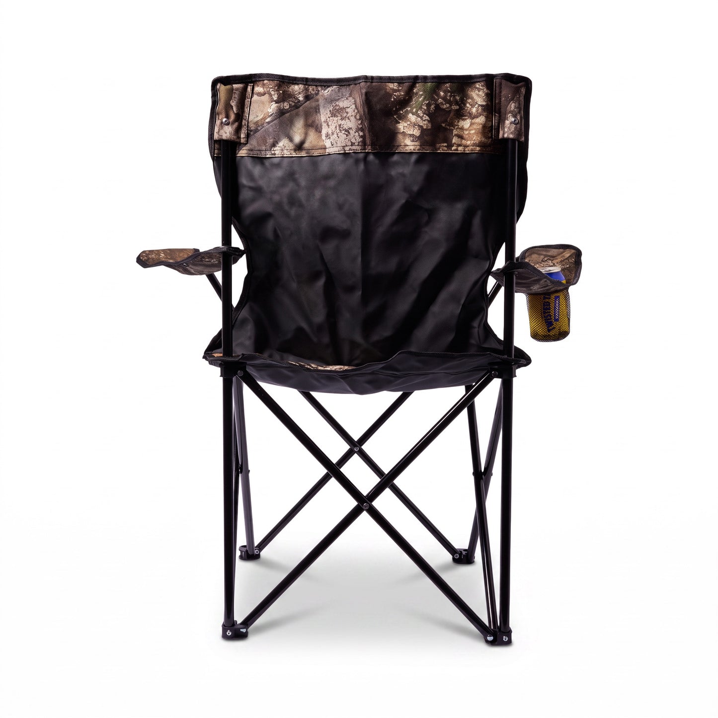 A folding camp chair with a black fabric body, camouflage print fabric on the backrest and armrests, and a side cup holder holding a yellow bottle, shown against a plain white background.