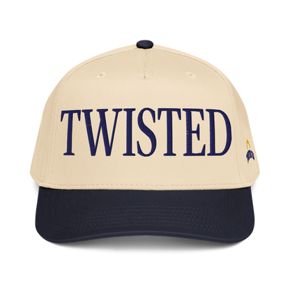 Twisted Tea baseball cap with cream crown and navy brim, featuring embroidered navy “Twisted” lettering on the front panel.