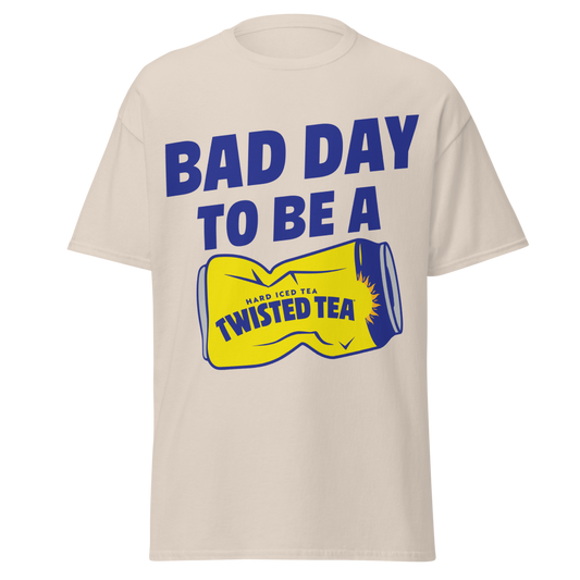 Beige t-shirt with 'Bad Day to Be a Twisted Tea' graphic on a white background