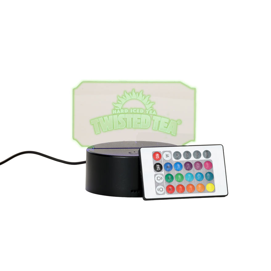 Glowing rectangular light with 'Twisted Tea' branding and a remote control on a white background