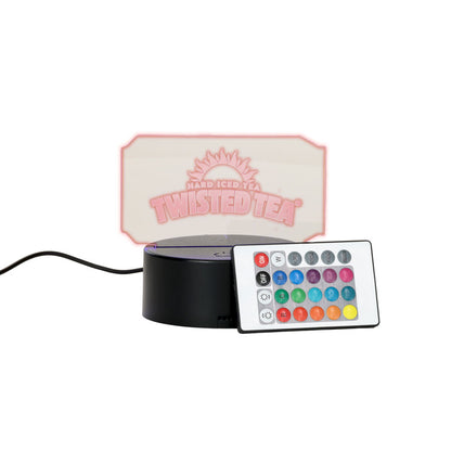 Light-up sign with remote control and Twisted Tea branding on a white background