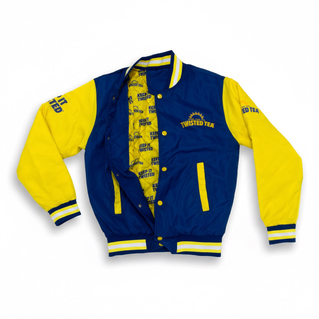 A varsity-style jacket with royal blue body panels and bright yellow sleeves, collar, and trim. The front is open to show a yellow printed lining with repeated 'Twisted Tea' text.