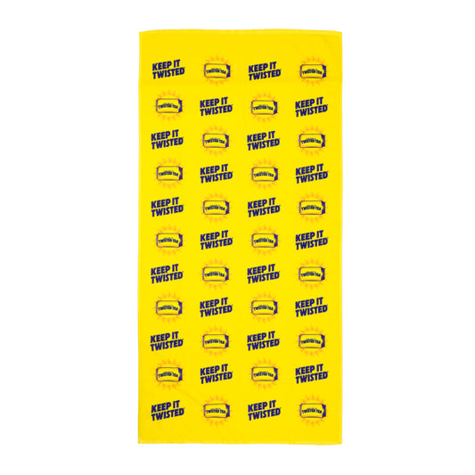 Yellow towel with 'Keep It Twisted' text and logo pattern on a white background